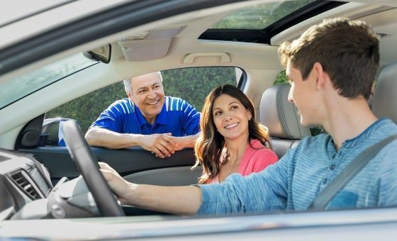 teenage-boy-in-drivers-seat-with-parents-watching on simi valley road